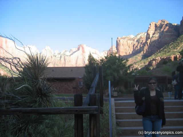 Joann in Zion National Park gives the peace sign.jpg
